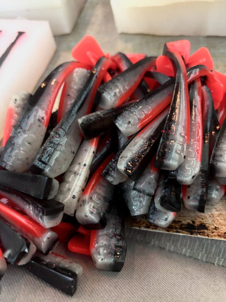 A pile of RX Paddle Tails in Slay Dirty.